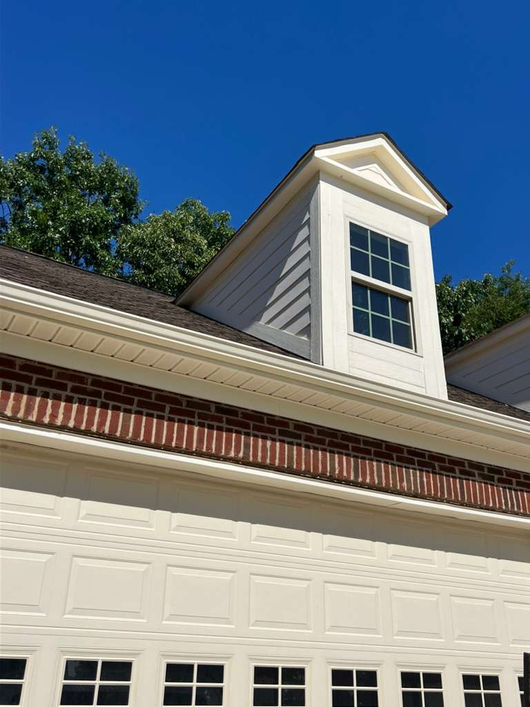 Dormer siding after a soft wash. White again, zero damage.